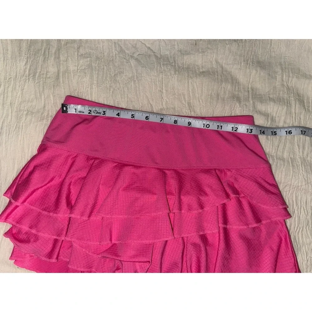 Lucky In Love pink ruffled‎ skort with undershorts and a 4